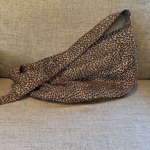 Susan Lanci Dog Cuddle Carrier Cheetah Print with Tan interior gently used